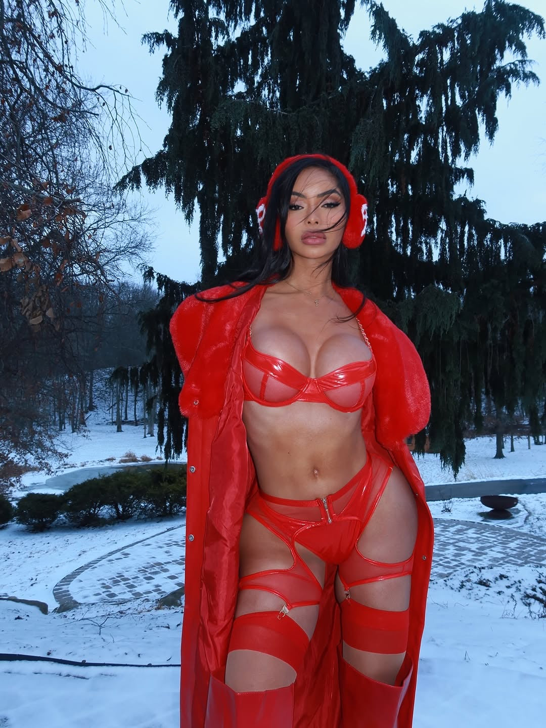 Person wearing a red outfit in a snowy outdoor setting. Take Me There- 3 Piece Vinyl Mesh Set- Red. Mi Amore House of Styles
Explore Mi Amore’s exquisite lingerie sets. Perfect for every occasion, combining delicate lace and comfort. Shop in Trinidad and Tobago